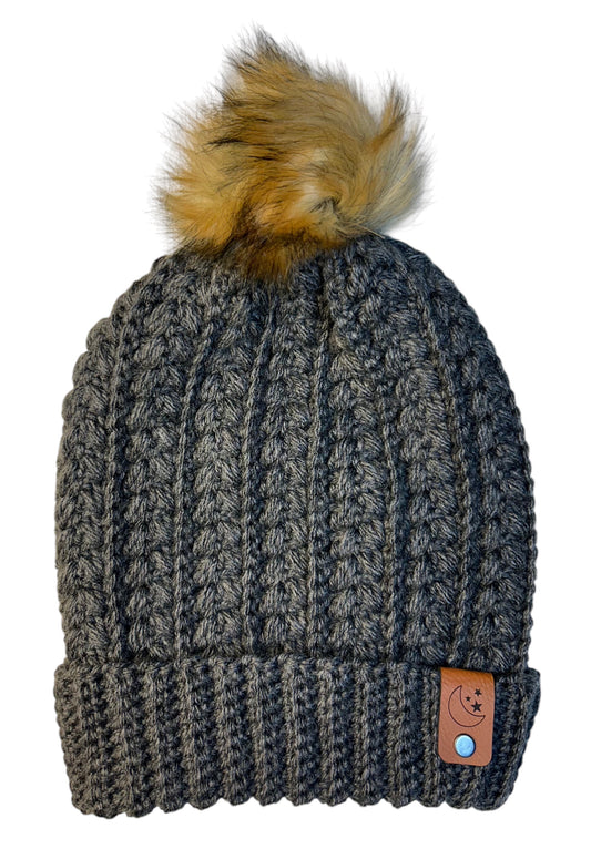 Snowy Wheat Beanie - Grey Heather with faux fur pom, ribbed knit, and leather patch.
